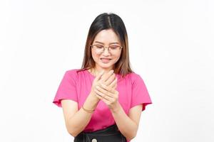 sofferenza dolore su mani di bellissimo asiatico donna isolato su bianca sfondo foto