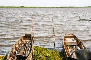 vecchio di legno barca pescatore nel lago Sud Tailandia e viaggio foto