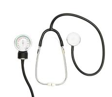 concetto medico con stetoscopio, manometro isolato su bianco. copia spazio. vista da vicino foto