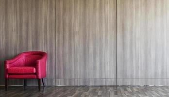 rosso divano su sinistra di camera decorato con parete e legna pavimento foto