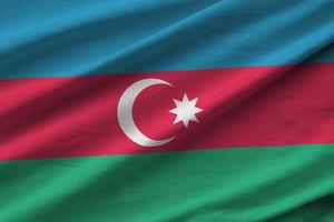 azerbaijan bandiera con grande pieghe agitando vicino su sotto il studio leggero al chiuso. il ufficiale simboli e colori nel bandiera foto