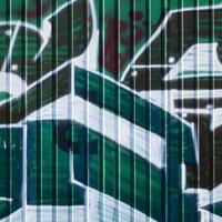 frammento di graffiti disegni. il vecchio parete decorato con dipingere macchie nel il stile di strada arte cultura. colorato sfondo struttura nel verde toni foto