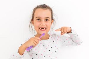 poco ragazza Spettacoli un' dente bambino spazzolino foto