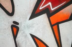 il vecchio parete, dipinto nel colore graffiti disegno rosso aerosol vernici. sfondo Immagine su il tema di disegno graffiti e strada arte foto