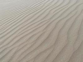 deserto e sabbia onde e ondulazione sfondo foto