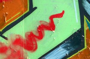 strada arte. astratto sfondo Immagine di un' frammento di un' colorato graffiti pittura nel cachi verde e arancia toni foto