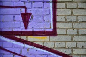 vicino su Visualizza di graffiti disegno particolari. sfondo Immagine su il tema di strada arte e vandalismo. struttura di il parete, dipinto con aerosol vernici foto