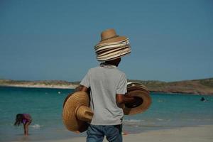 cappelli per vendita su messicano spiaggia foto