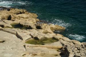 santo Peter piscine Malta roccia formazione buco su rocce foto