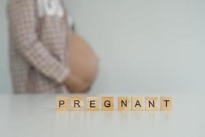 il lettera è scritto di il incinta persona. Usato per gravidanza foto