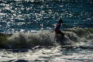 persone nuoto nel atlantico oceano nantucket martha spiaggia foto