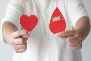 sangue donazione concetto. dare sangue Salva su per tre vite. foto