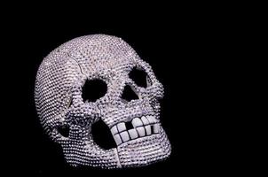 metallo cranio su nero sfondo foto