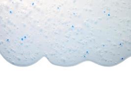 gel con ossigeno bolle. astratto trasparente liquido sfondo. antibatterico gel, ialuronico acido. macro avvicinamento foto