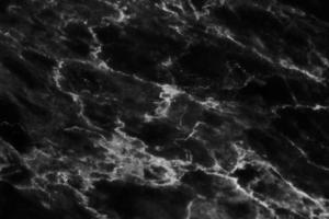 trama di sfondo in marmo nero. vuoto per il design foto