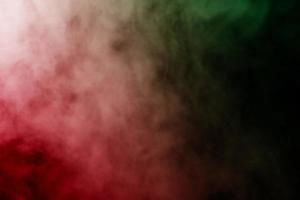 astratto Fumo isolato su nero sfondo, arcobaleno polvere, fuori di messa a fuoco foto