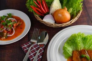 insalata piccante di sarde con pomodori foto