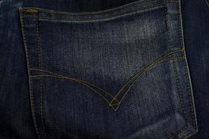 trama della tasca dei jeans da vicino, sfondo.