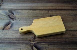 mini taglio tavola su un' di legno tavolo. foto