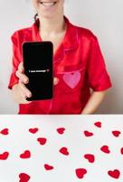 un' contento ragazza è Tenere un' smartphone con un attivato schermo con 1 sms Messaggio nel il forma di un' cuore. concetto di San Valentino giorno, febbraio 14. foto