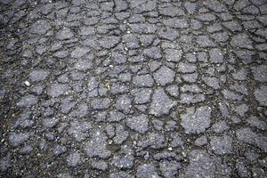 pavimento in asfalto screpolato foto