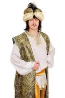 uomo in costume orientale foto
