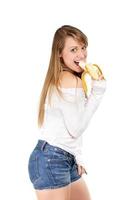donna mangiare Banana foto