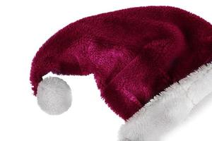 Natale cappello su un' bianca sfondo. rosso Santa Claus cappello con bianca pompon. foto