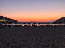 tramonto a matala spiaggia nel Creta, Grecia foto