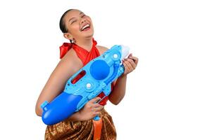 ritratto bellissimo donna nel Songkran Festival con acqua pistola foto