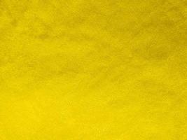 giallo velluto tessuto struttura Usato come sfondo. vuoto giallo tessuto sfondo di morbido e liscio tessile Materiale. Là è spazio per testo. foto