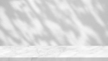 bianca marmo tavolo con le foglie ombra sfondo, adatto per Prodotto presentazione sfondo, Schermo, e finto su. foto