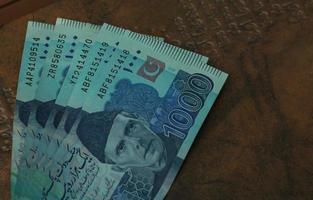 i soldi di Pakistan. pakistano rupia fatture. pkr banconote. 500 1000 5000 rupie. attività commerciale, finanza, notizia sfondo. pakistano moneta Appunti. foto