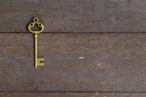 vecchio chiave Vintage ▾ su di legno sfondo con spazio foto