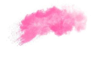 rosa polvere particelle spruzzo su bianca sfondo.rosa polvere spruzzata. foto