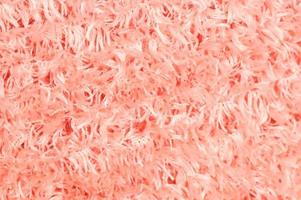 Close up di morbido tappeto di cotone rosa foto