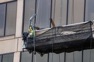 grattacielo finestre pulizia nel Manhattan foto