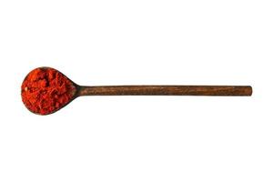3580 di legno cucchiaio con rosso condimenti isolato su un' trasparente sfondo foto
