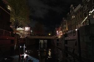 amsterdam canali crociera a notte foto