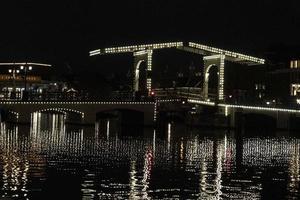 amsterdam canali crociera a notte ponte foto