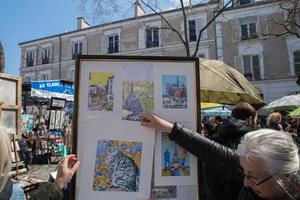 Parigi, Francia - Maggio 1 2016 - artista e turista nel montmartre foto