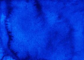 acquerello buio blu sfondo pittura struttura. Vintage ▾ mano dipinto indaco blu colore sfondo. macchie su carta. foto