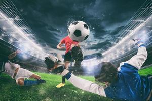 vicino su di un' calcio azione scena con competere calcio Giocatori a il stadio durante un' notte incontro foto