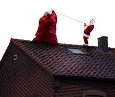 Santa Claus pronto per consegnare regali per Natale foto