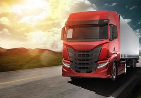 rosso moderno camion in movimento veloce su il strada a tramonto con naturale paesaggio foto