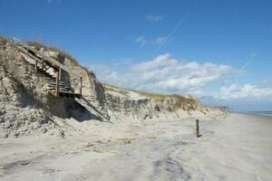 tempesta ondata danno per spiaggia a jekyll isola foto