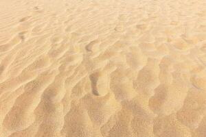 sabbia spiaggia sfondo e struttura modello con spazio. foto