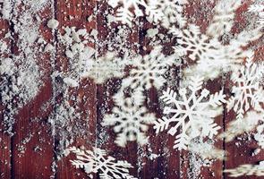 Natale sfondo con neve su un' legna pavimento foto