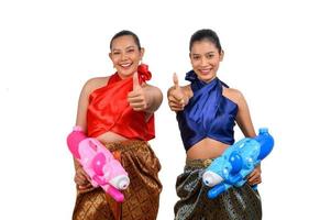 Due bellissimo donna nel Songkran Festival con acqua pistola foto