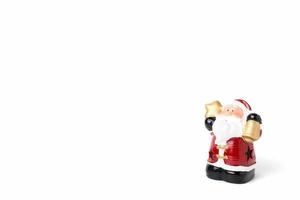 figurina di Babbo Natale su uno sfondo bianco foto